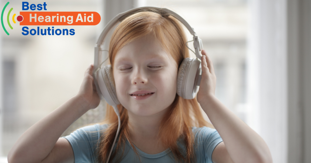 young girl using headphones